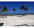 Panoramic ocean view, beach front 2br/2ba condo overlooking World’s 2nd longest Coral Reef